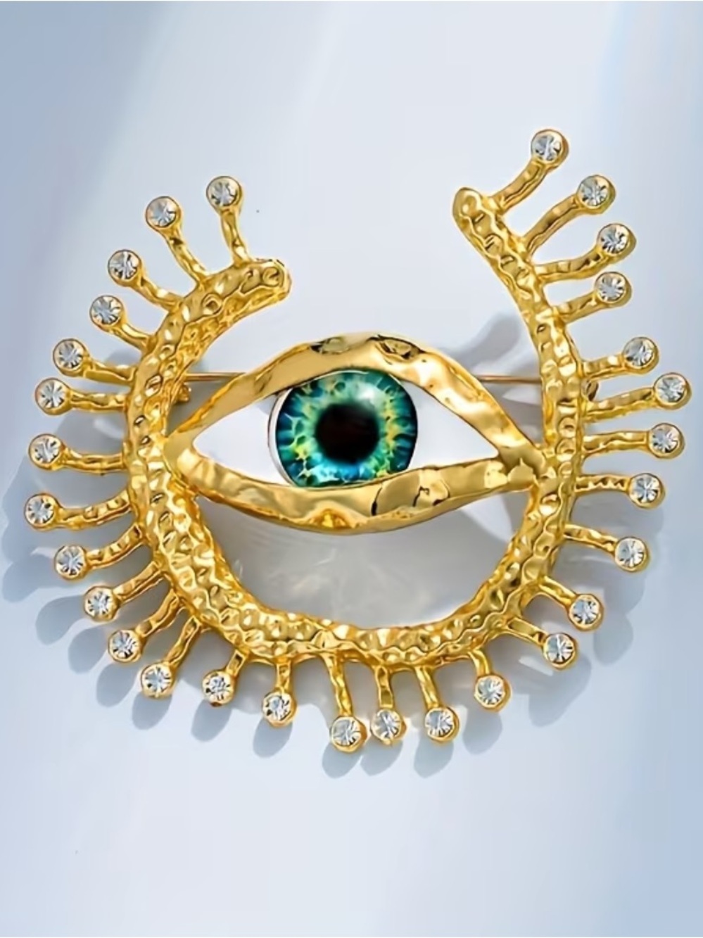 Classic Gold Eye Brooch with Blue-Green Iris